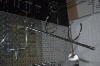Держатель для плоек на перфорацию