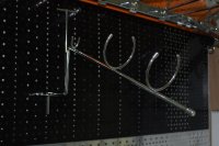 Держатель для плоек на перфорацию